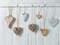 Hearts hanging on wooden background Poster Print by Assaf Frank - Item # VARPDXAF20141122022